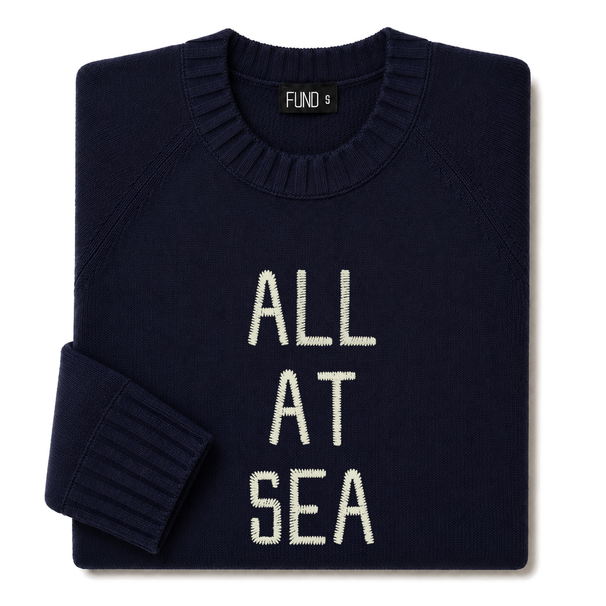 Made-in-England "All at Sea" Embroidered Jumper in Navy, folded