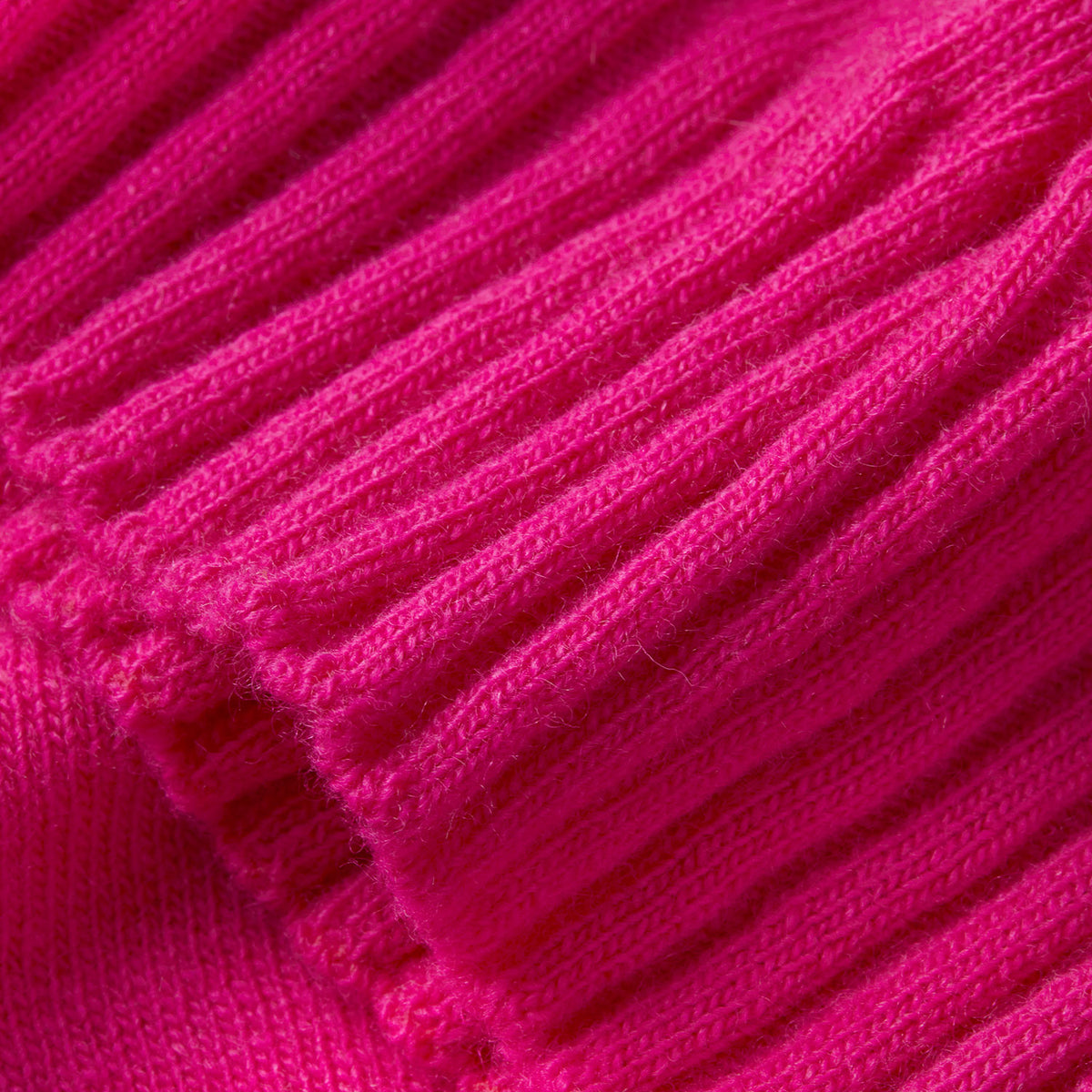 Made-in-England "Bright Side" Embroidered Jumper, Bright Pink yarn close up